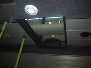 manual escape hatch assembled with long side against vehicle direction on a minibus